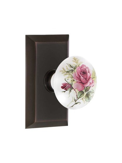 New York Rosette Door Set with Rose Porcelain Knobs in Timeless Bronze.